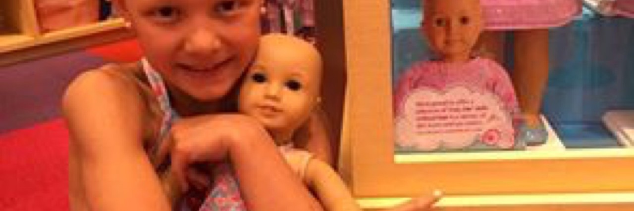 Bald American Girl Doll Makes Day of Young Girl With Alopecia Mia Bailey and her bald doll