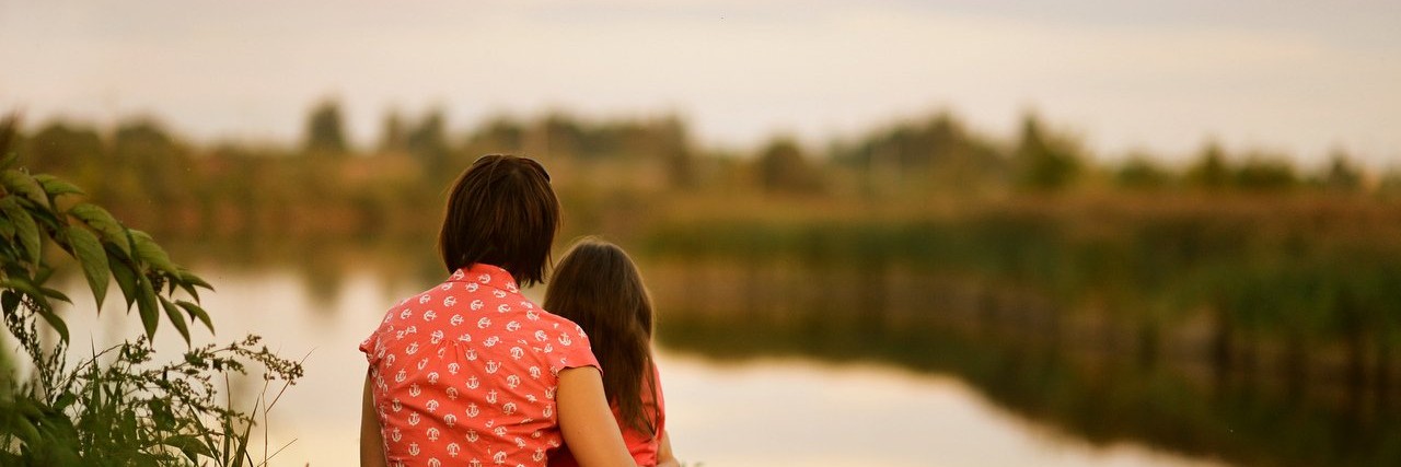 Apraxia: People Ignoring My Daughter After She Speaks mother sitting with daughter