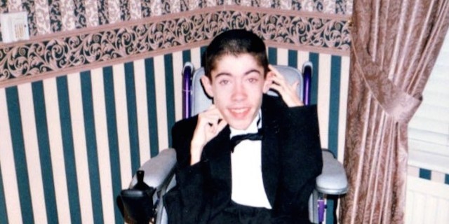 Why Duchenne Has Been a Merciless Hurricane for Our Family Tree Claire's brother Mark, smiling in his wheelchair