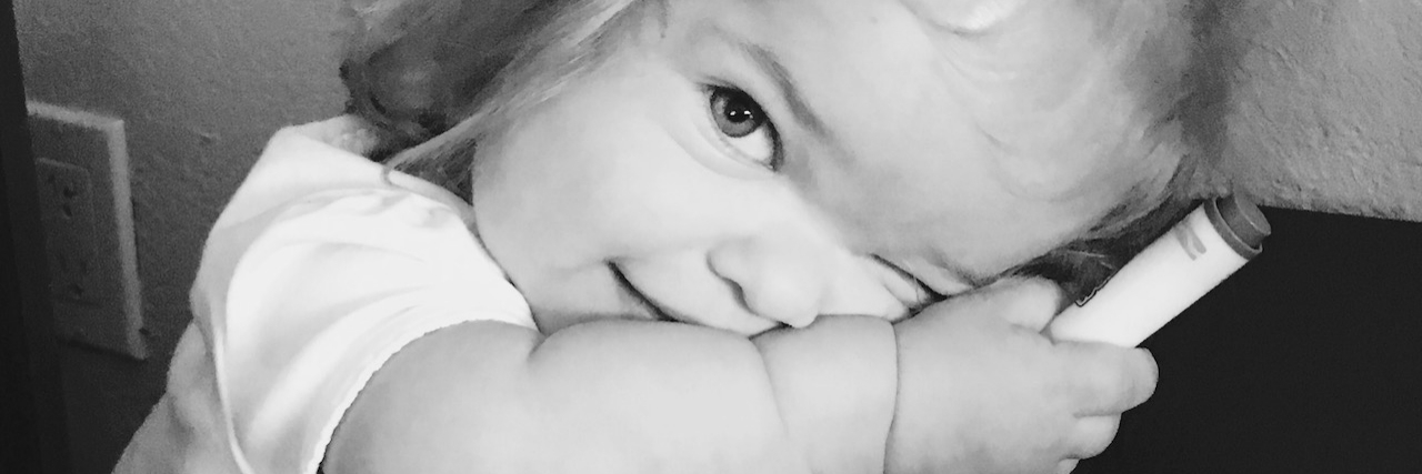 Mother to Child With Achondroplasia Responds to Cruel Comment Naomi holding a marker