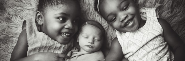 three little girls smiling