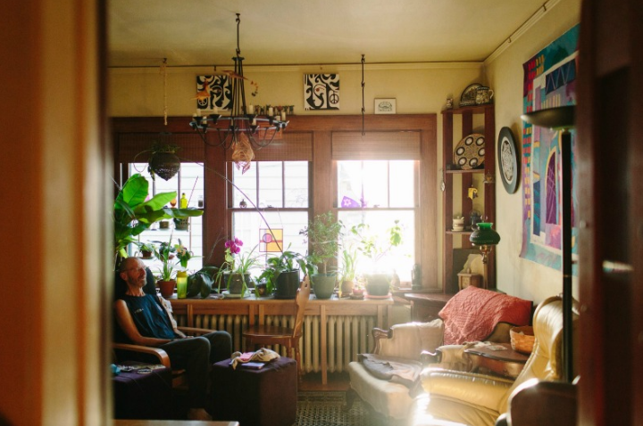 An ALS diagnosis can initially lead to such a sense of isolation. Here, Ray sits with his eyes closed in the living room.