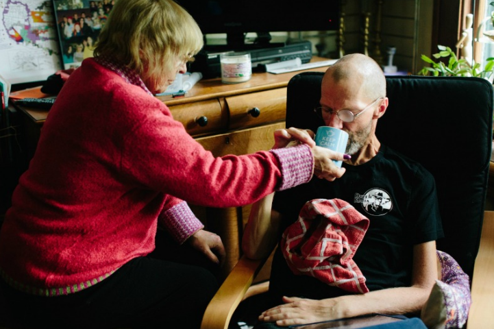 Ray, who grew up in London, loves a proper “cuppa.” Here, his mother Jeanne, visiting from Hertfordshire, helps him drink tea. Ray says, “Keep calm and call Mum.”