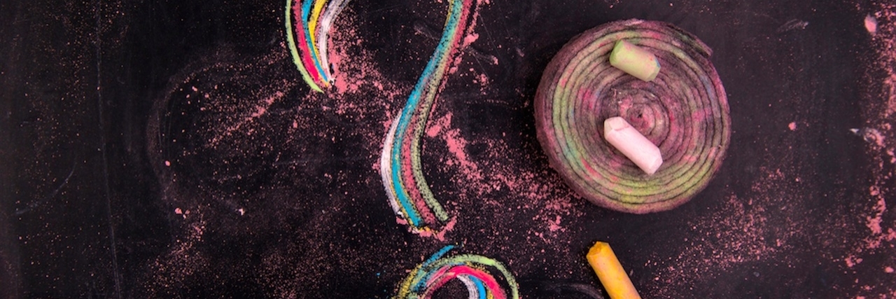 Questions to Ask Yourself After a Truma: Signs of PTSD chalk drawing of a colorful question mark