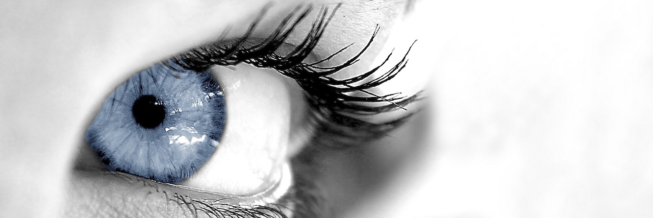 The Difference Between Major Depressive Disorder and Sadness Close-up of very blue eye