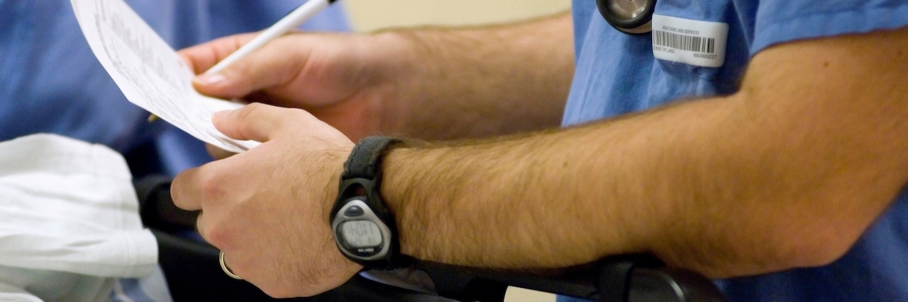 Letter to Emergency Room Doctor Who Called Me a Drug Seeker doctor in hospital writing notes