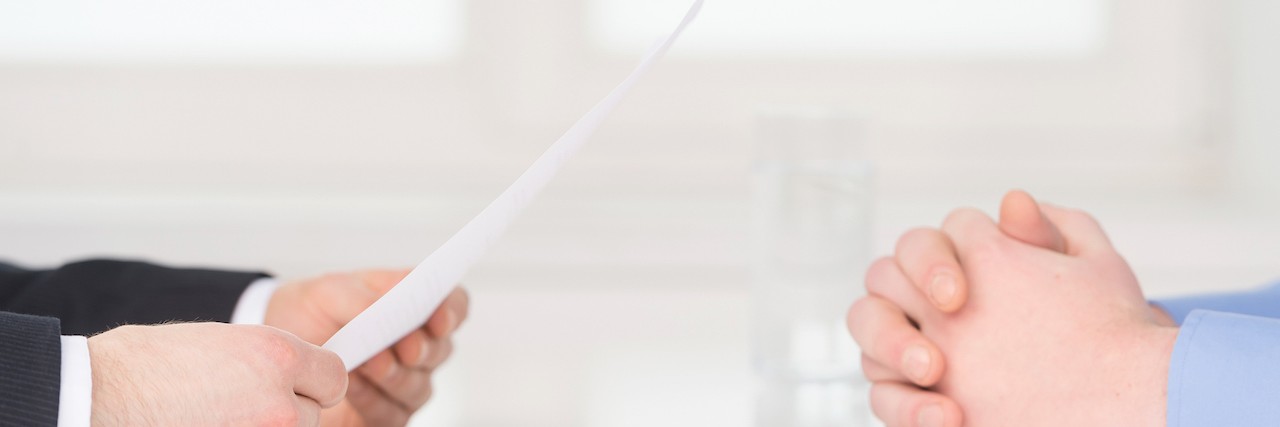 Declaring My Congenital Hydrocephalus at a Job Interview Close-up of two businesswoman around the table during job interview
