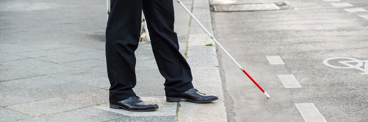 Mom Starts 'BlindNewWorld' to Challenge Stigma Blind Son Faces A blind person crosses the street.