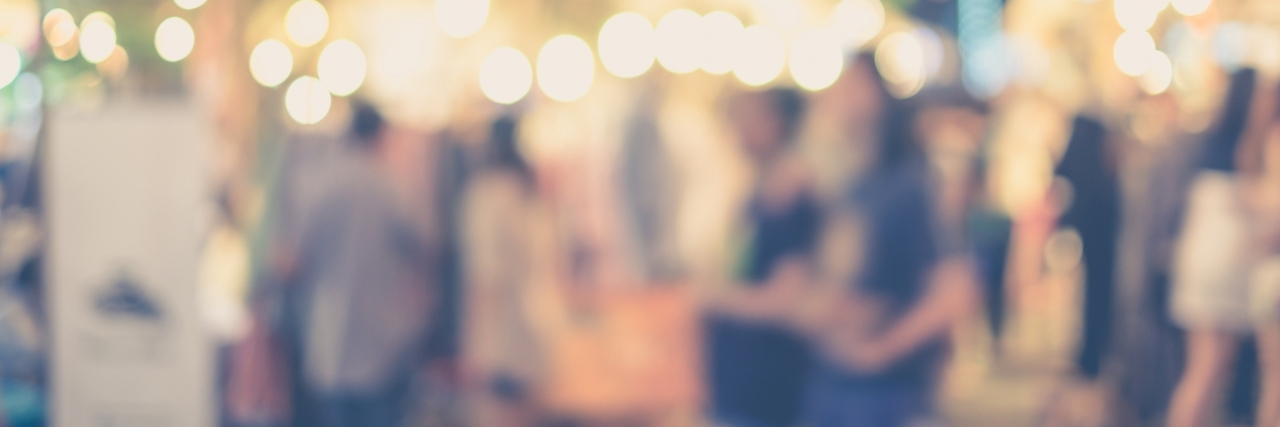 Self-Care Tips for Dissociation blurred people in street market