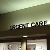 Urgent Care Sign with Clock below in Anticipation of the next patient