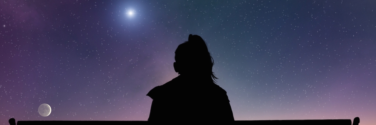 What I Wish I Knew When I Was Diagnosed With Anxiety Girl watching the stars on bench