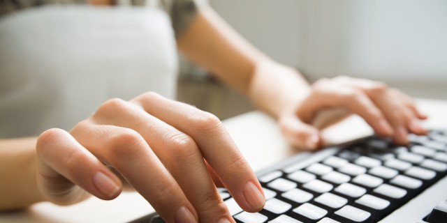 Self-Diagnosing Myself on the Autism Spectrum as an Adult: Where Do I Belong? Close-up of hands typing on a keyboard