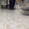 Feet of different people sitting in hospital waiting room