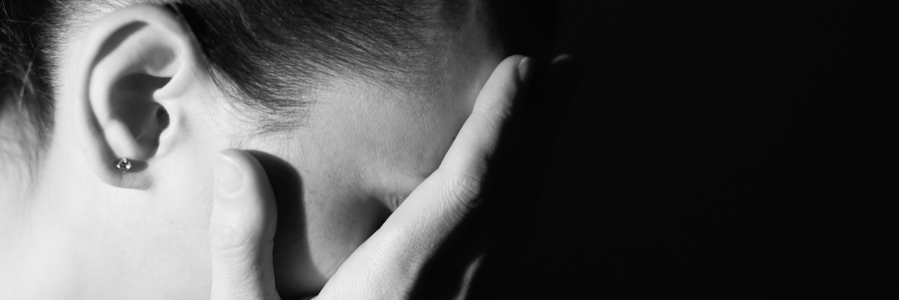 Portrait of stressed young woman.