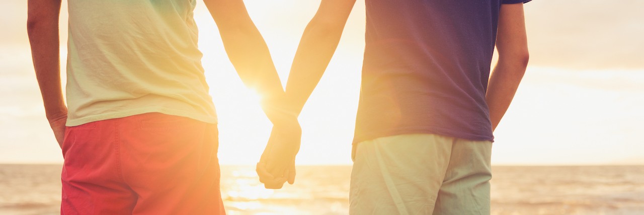 Being in a Relationship With Someone Who Has Gastroparesis Gay couple watching sunset