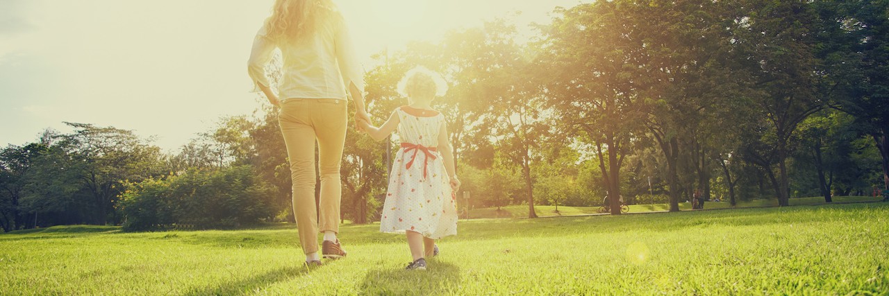 Advice for Mom Feeling Like a Bad Parent Mum and daughter outside in the park