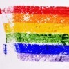 a rainbow flag painted in a textured background