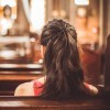 Woman visiting a christian church