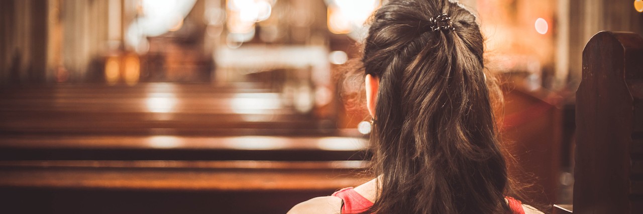 Contemplating Suicide on Easter Sunday Woman visiting a christian church