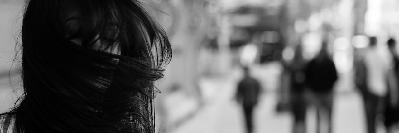 Responding to People Who Think My Anxiety Isn't Real woman with hair blowing in her face