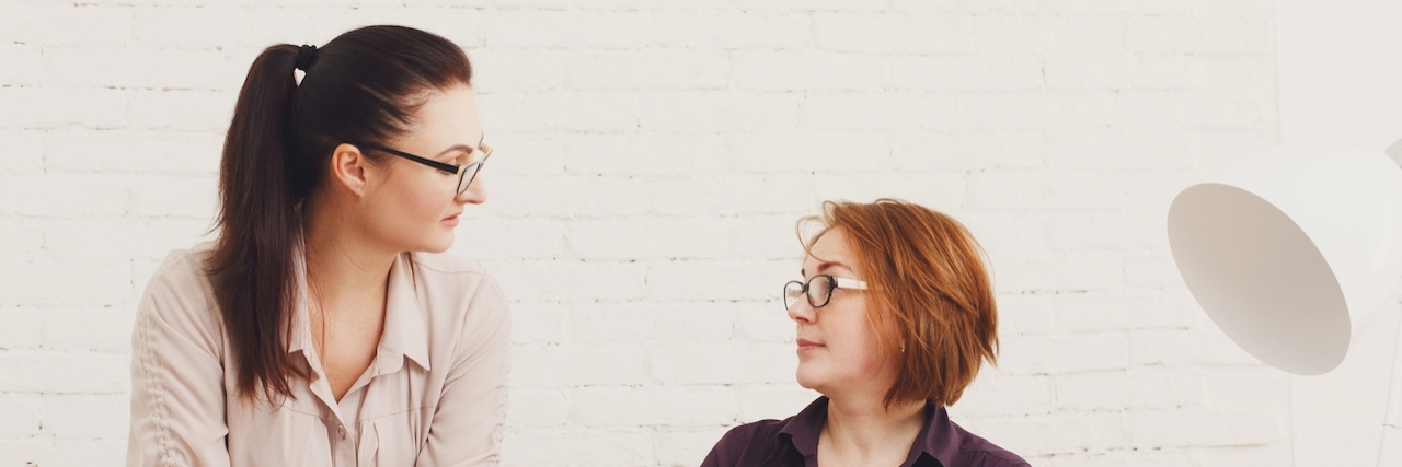 Coping With a Changing Appearance When Taking Steroids Conflict. Women discuss project in office