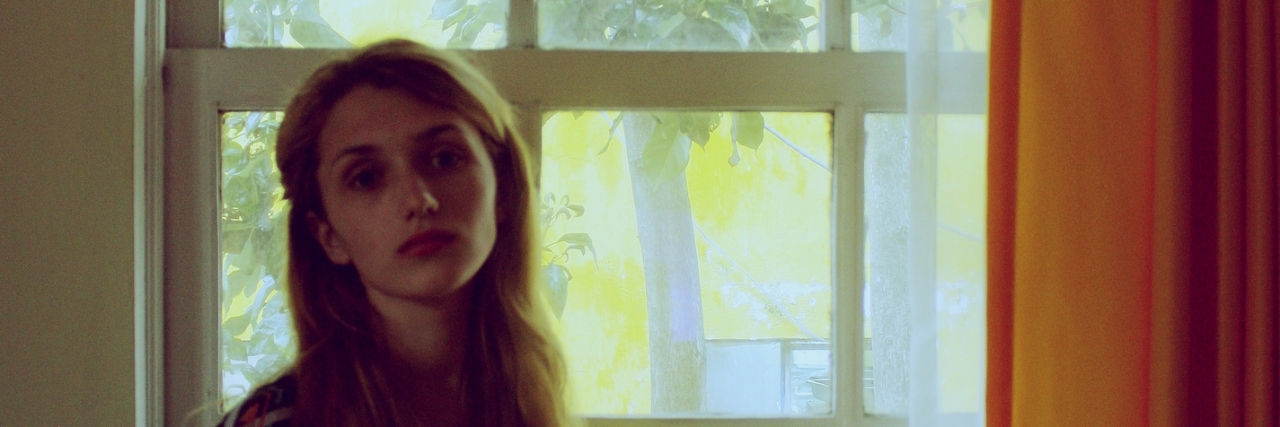 'I Feel So Bipolar': Why We Shouldn't Say Phrases Like This Portrait of the beautiful girl at a window