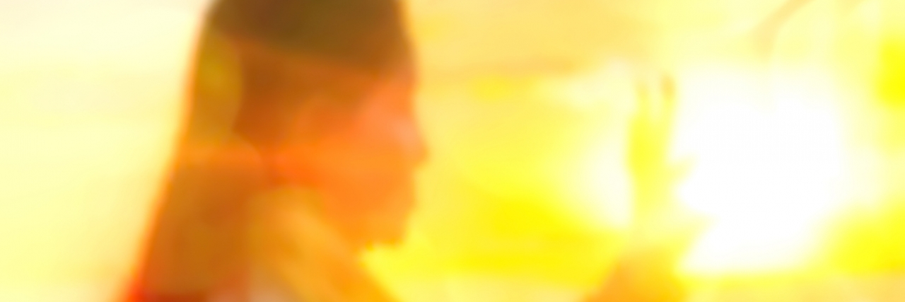 A Letter Asking Depression to Be My Friend Abstract Blurred and soft photo of Women on hilltop with bokeh of sunrise on the natural background