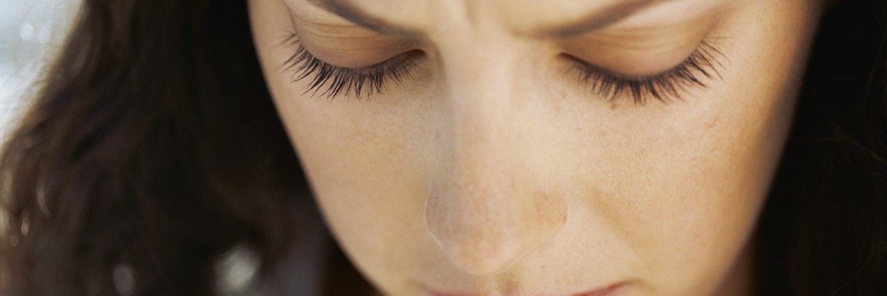 Thank You Letter to Loved One Who Helps With Anxiety close-up of a businesswoman with her eyes closed