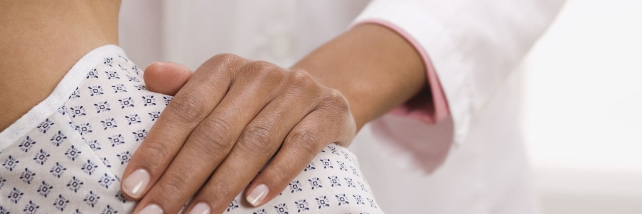 When Experienced Doctors Don't Listen to Patients doctor with hand on patient