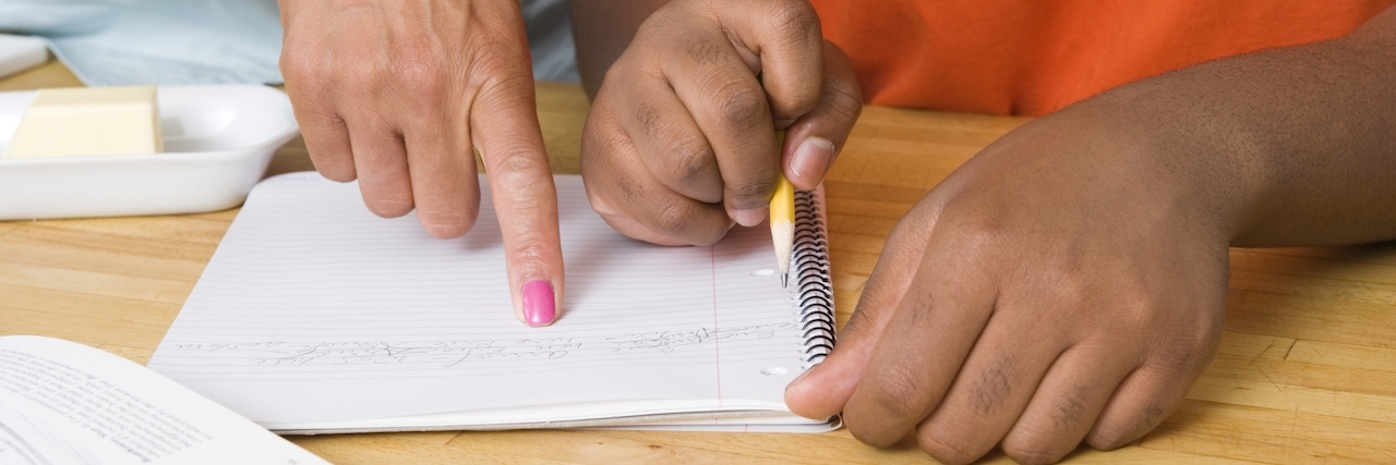 A Letter to a Loved One Who Just Received a Bipolar Diagnosis Mother helping son with homework