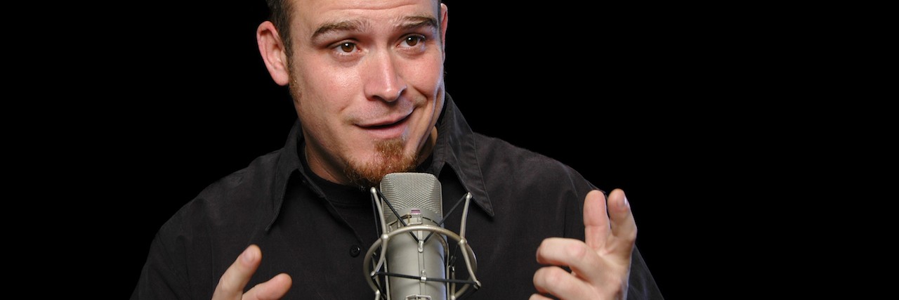 How to Joke About Obsessive-Compulsive Disorder (OCD) Comedian performing on a black background