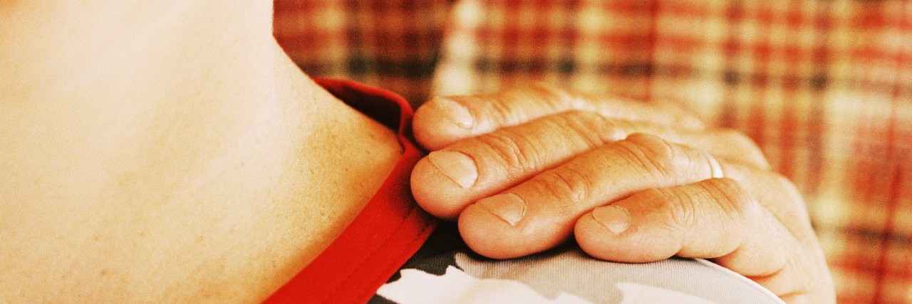 Dystonia: Why It’s OK for People to Ask How I’m Feeling person places hand on someone’s shoulder