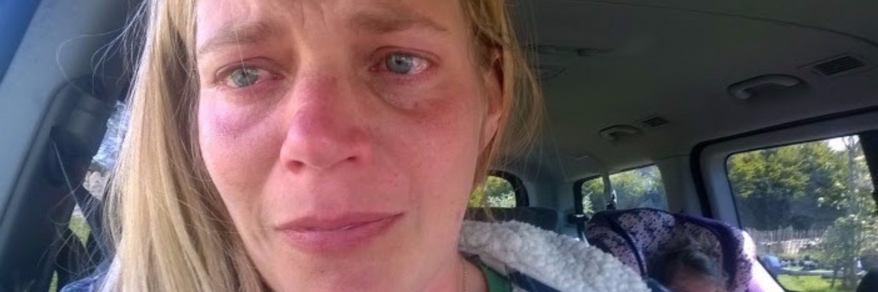 Response to Woman Angry About Accessible Parking Spot woman crying in her car