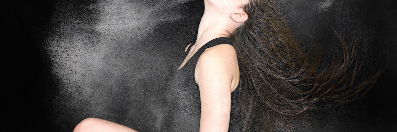 Advice for Living With Hypokalemic Periodic Paralysis as a Teenager Jessica with a cloud of dust in the air