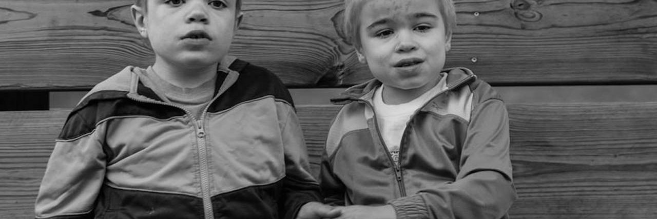 Sanfillipo Syndrome and Questioning If Everything Happens for a Reason brothers smiling