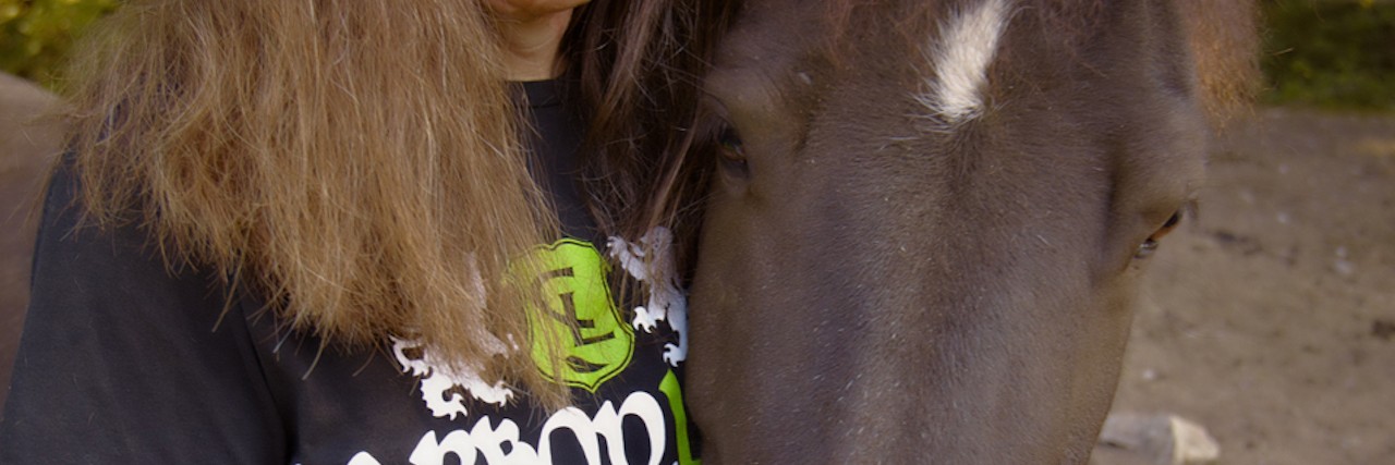 How to Describe Facial Differences Without Words Like 'Disfigured' dawn and her horse