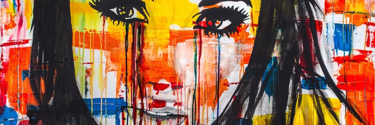 What It's Like to Live With Dysthymia (Persistent Depressive Disorder) Drawing of a woman crying with a colorful background