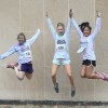 three women jumping in the air