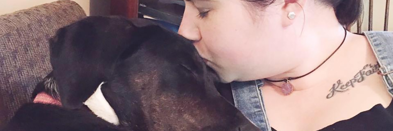 Helen with her service dog.