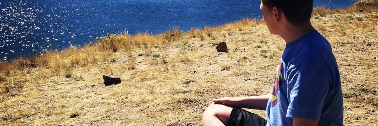 Child Loss and Taking Trips With Our Medically Complex Son kreed looking at a lake