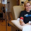 woman getting an infusion at doctor's office