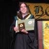 high school girl at podium with award