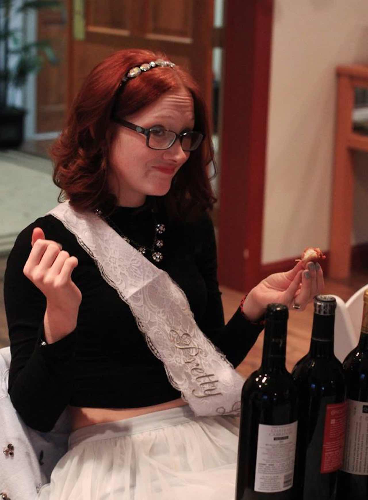 woman opening wine bottles