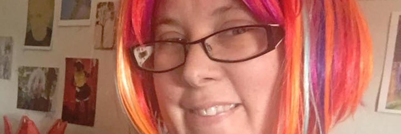 autistic woman with rainbow hair