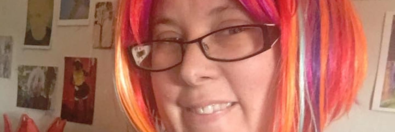 An Autistic Woman Addresses 9 Common Misconceptions About Autism autistic woman with rainbow hair