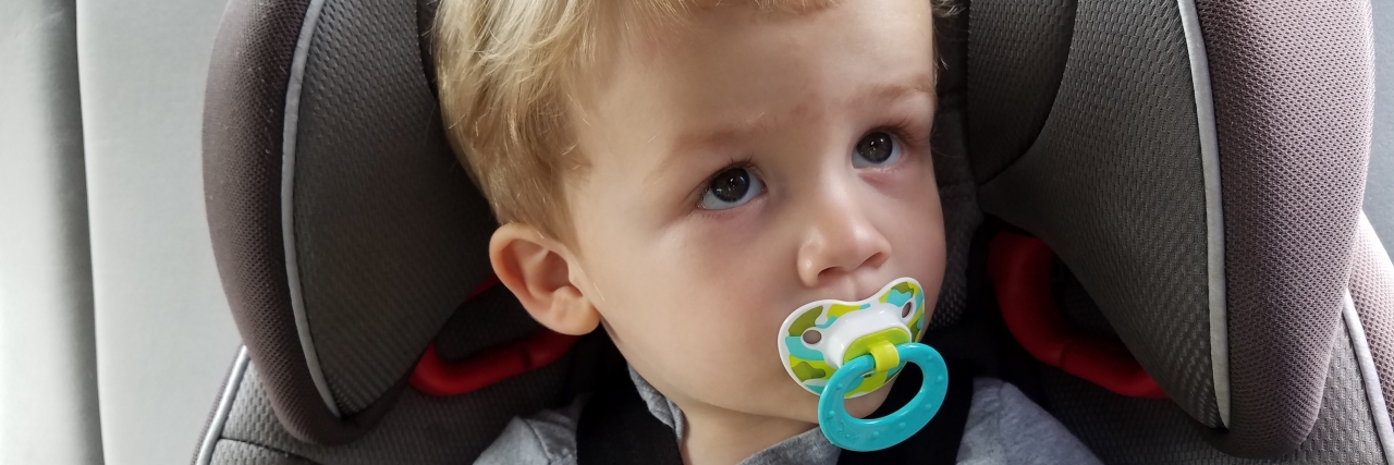 Mom Thanks Hairdresser Who Understood Son With Autism little boy in carseat