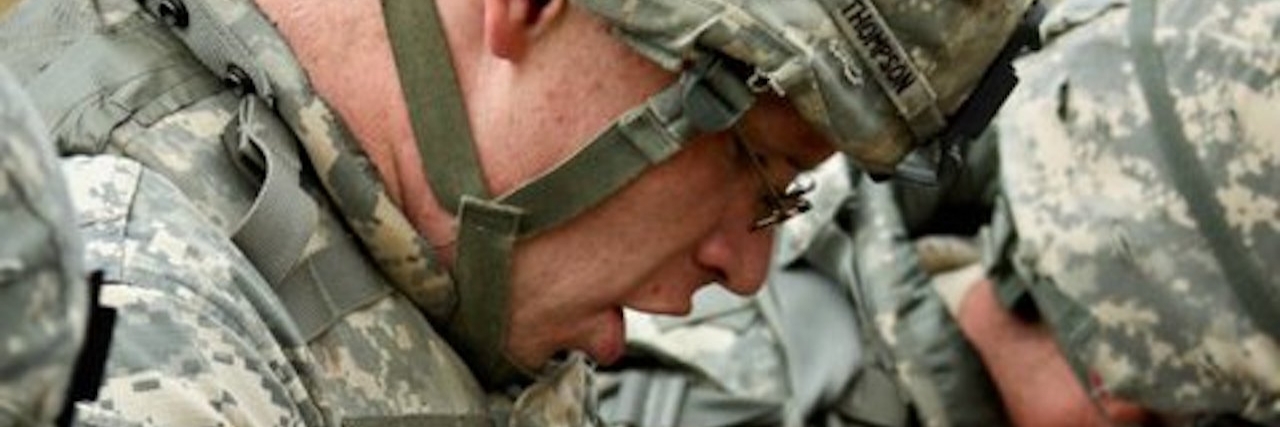 A Soldier and Army Veteran With Depression Learns to Ask for Help soldier with his brothers