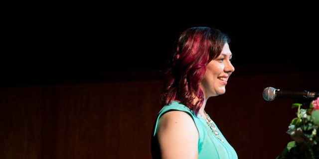 When I Overcame a Lifelong Fear to Advocate for My Daughter With Cystinosis Amanda giving her speech at Listen to Your Mother Vancouver