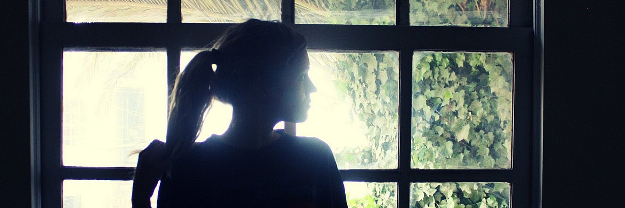Ehlers-Danlos Syndrome: When Doctors Questioned My Symptoms woman standing by window