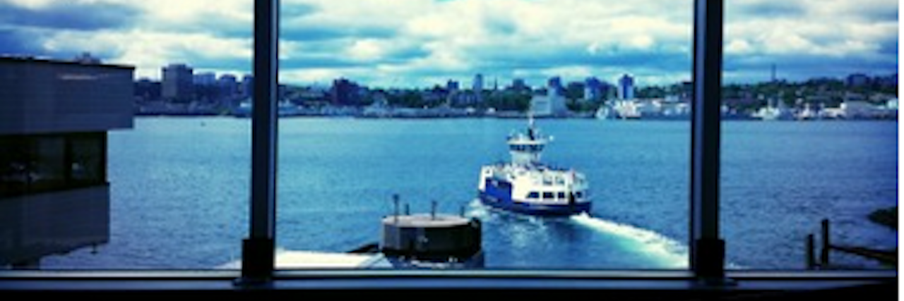 Witnessing a Suicide: What Do We Do in the Aftermath? A view of boats through a window